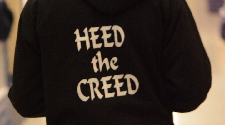 Heed the Creed on a sweatshirt